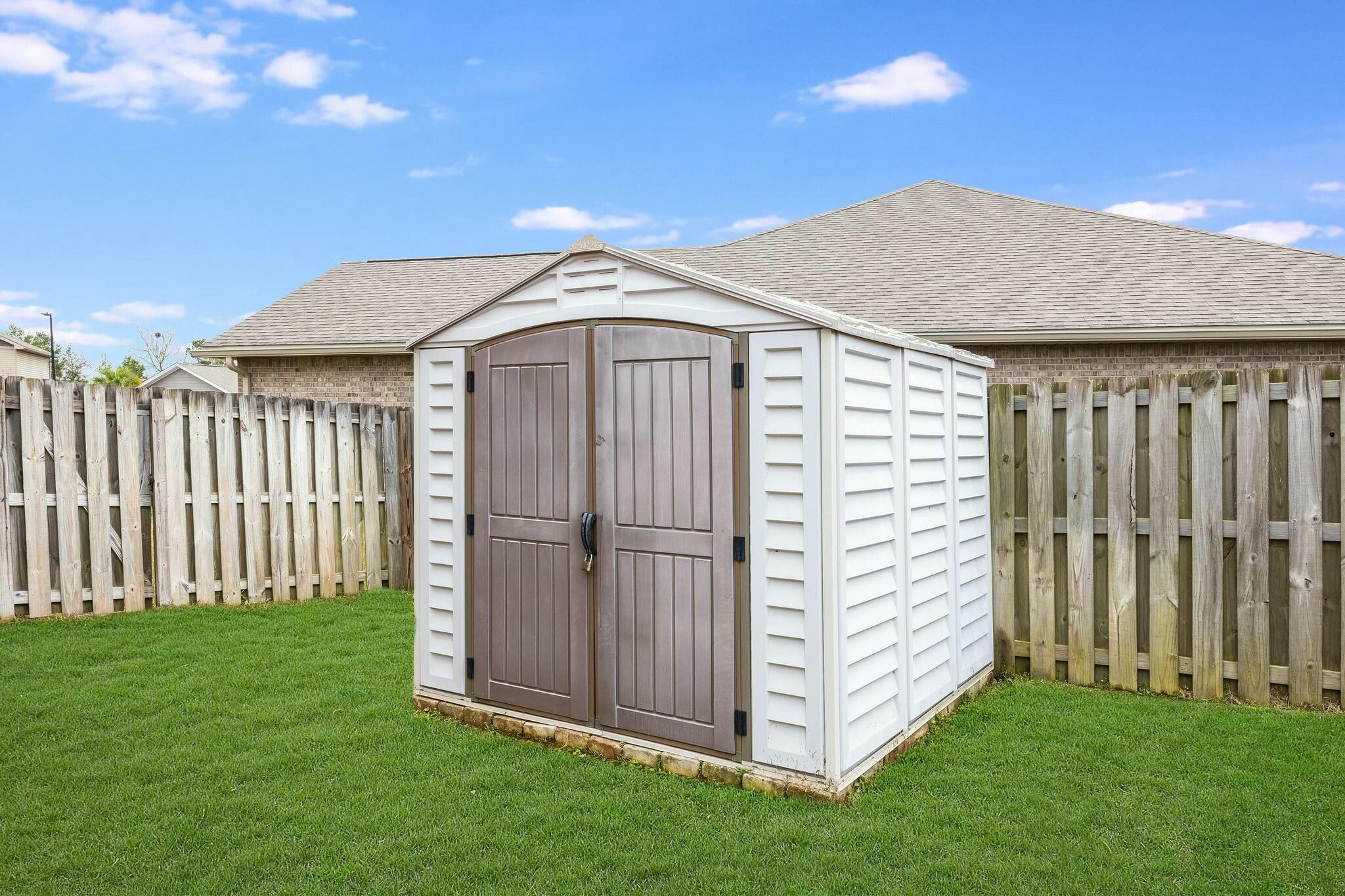367 Merlin Court Crestview, FL 32539 - Photo 41 of 46 a view of a house with a yard