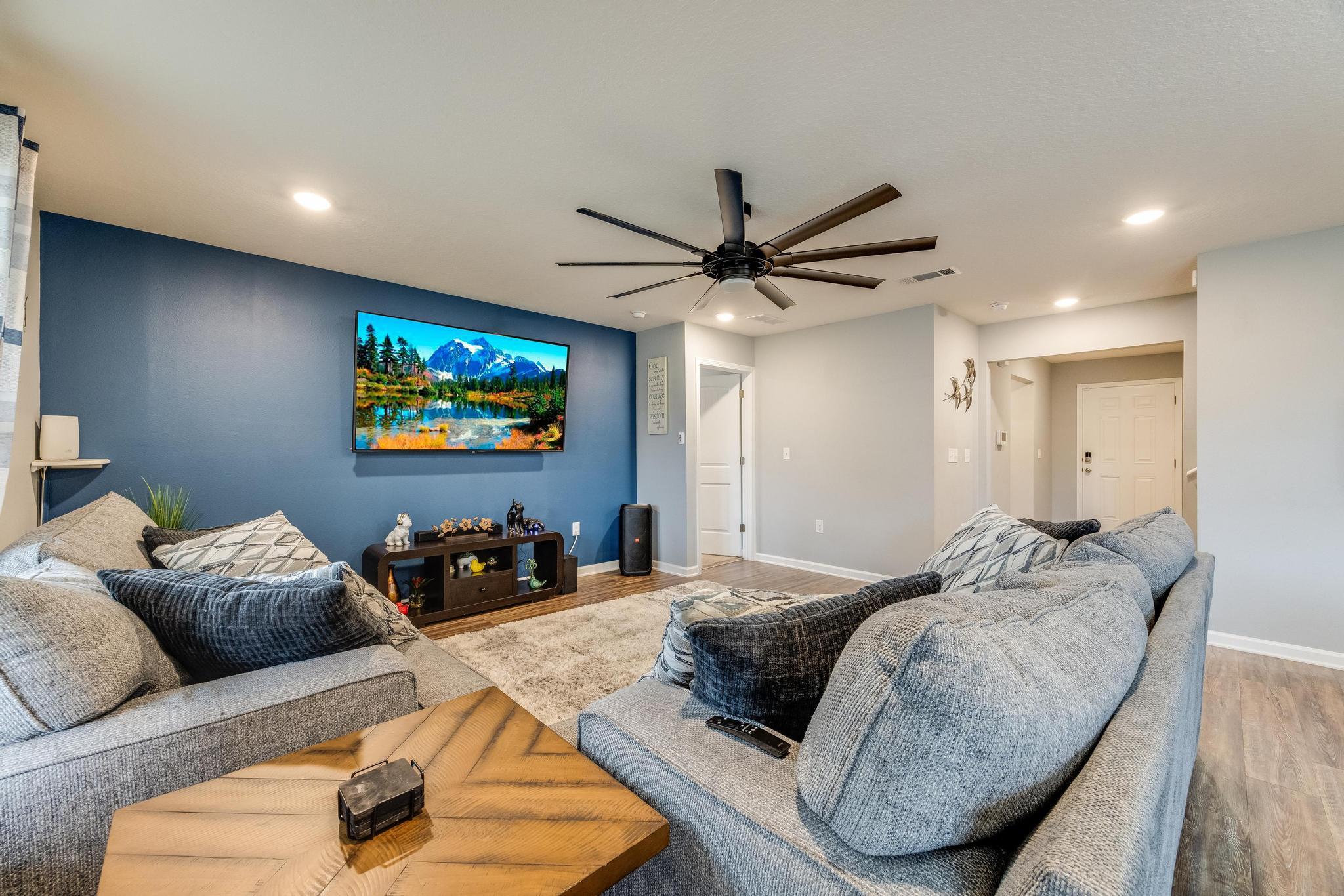367 Merlin Court Crestview, FL 32539 - Photo 7 of 46 a living room with furniture and a flat screen tv