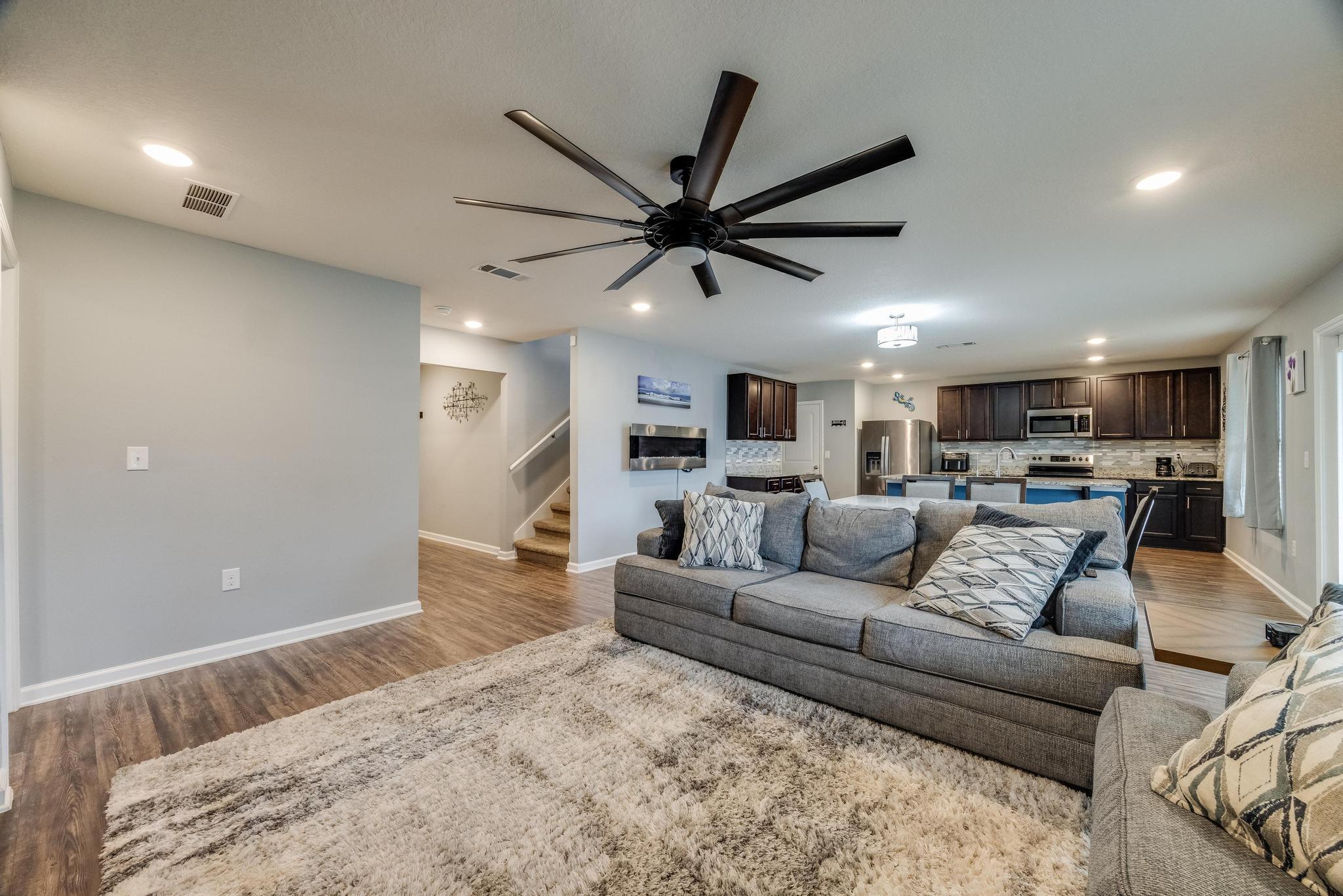 367 Merlin Court Crestview, FL 32539 - Photo 8 of 46 a living room with furniture and a wooden floor