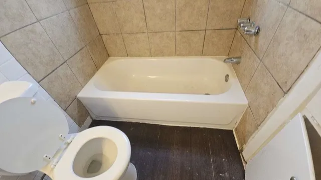 a bathroom with a sink and bathtub