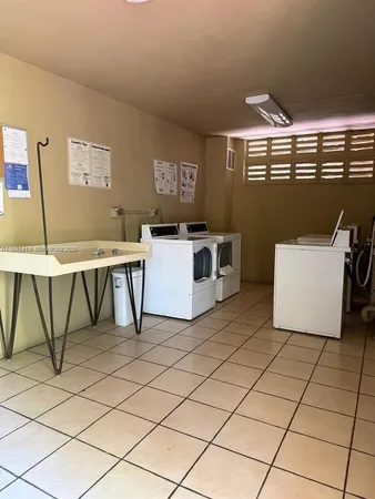 a workspace with furniture and window