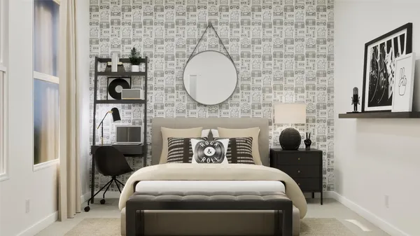 a bedroom with a bed and a mirror