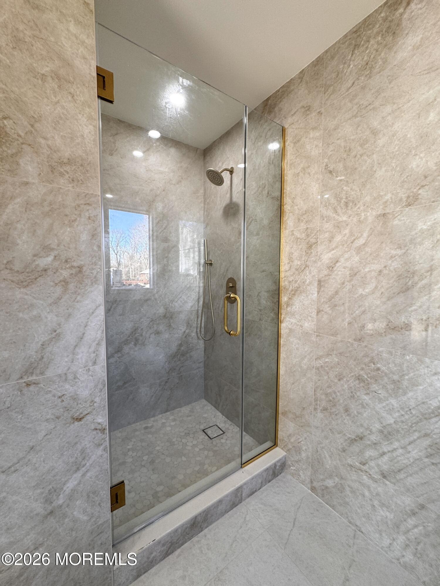 7 Whalepond Road Oakhurst, NJ 07755 - Photo 3 of 10 a bathroom with a shower
