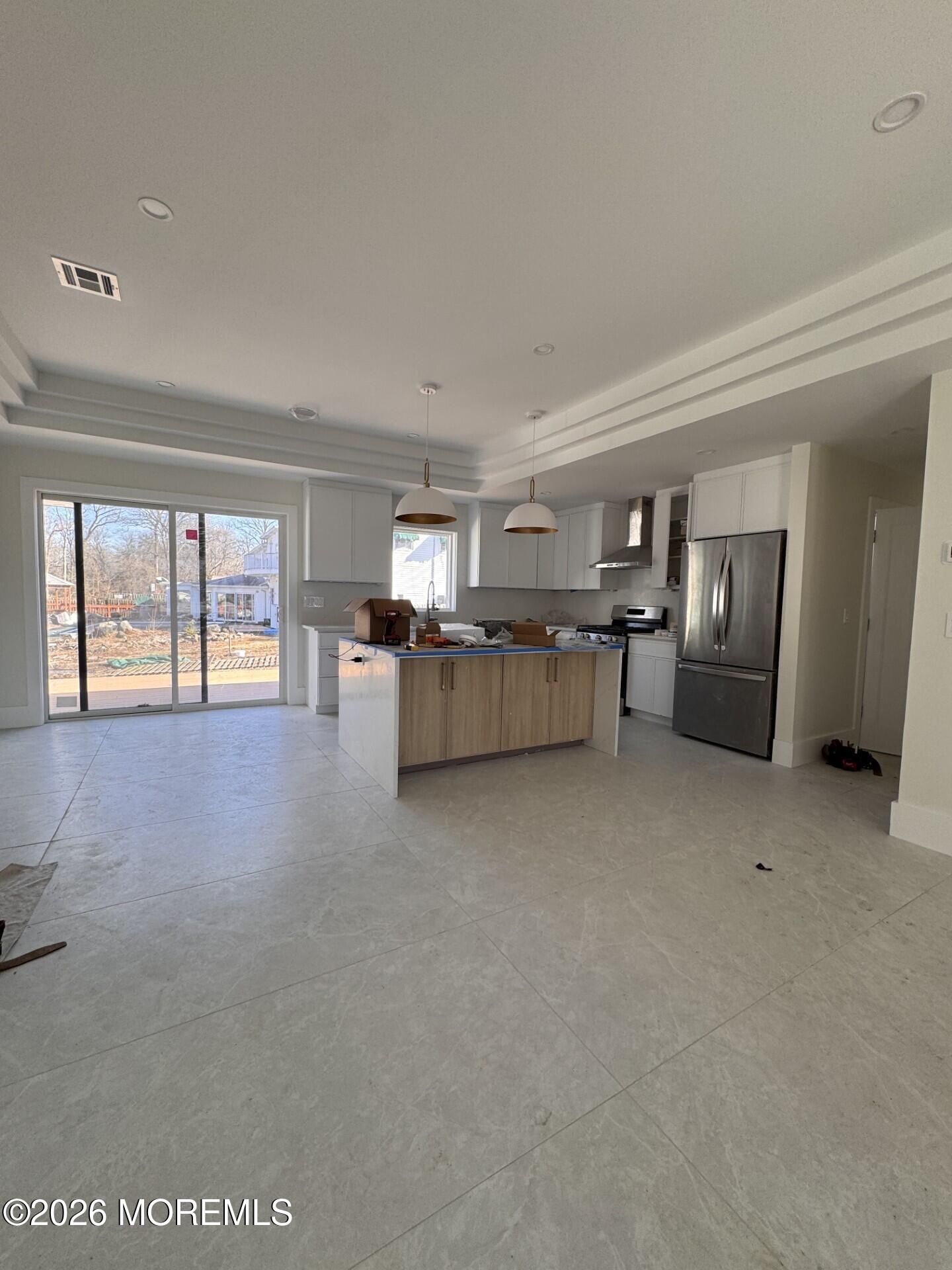 7 Whalepond Road Oakhurst, NJ 07755 - Photo 4 of 10 a view of a livingroom with furniture and an entryway
