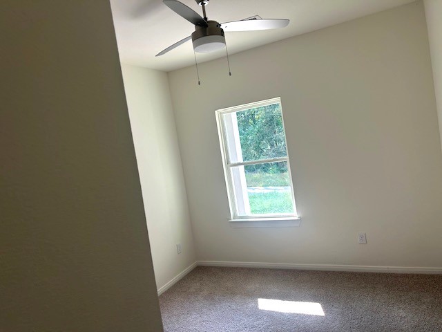 15010 Austin Road Willis, TX 77378 - Photo 11 of 22 an empty room with a window
