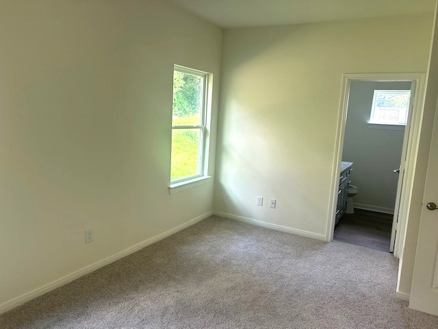 15010 Austin Road Willis, TX 77378 - Photo 13 of 22 an empty room with a window