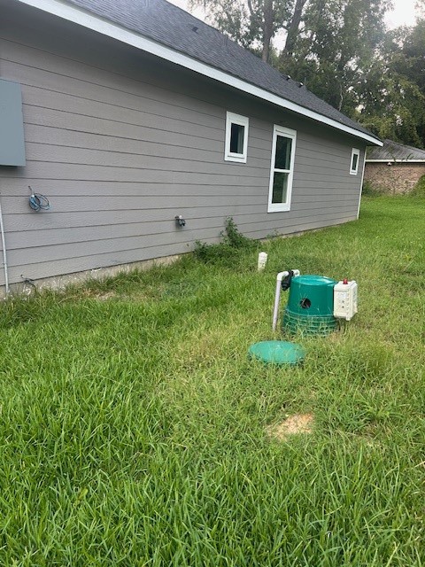 15010 Austin Road Willis, TX 77378 - Photo 22 of 22 a view of a house with a backyard space