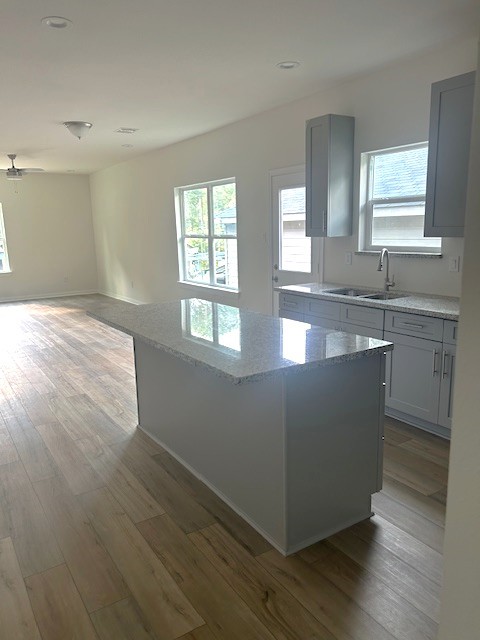 15010 Austin Road Willis, TX 77378 - Photo 6 of 22 a large room with wooden floor and windows