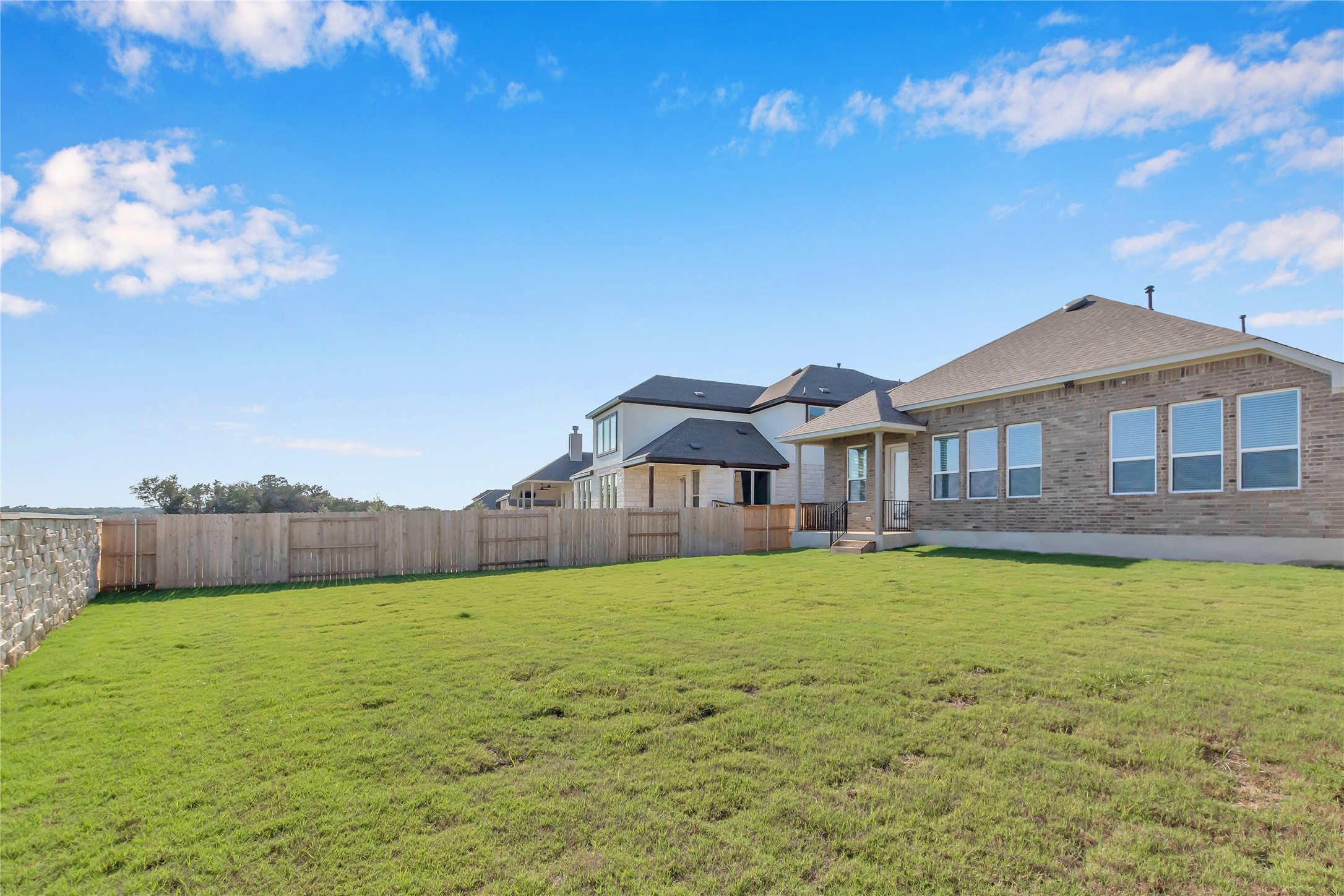 2140 Base Burner Path Leander, TX 78641 - Photo 25 of 27 a front view of a house with a yard