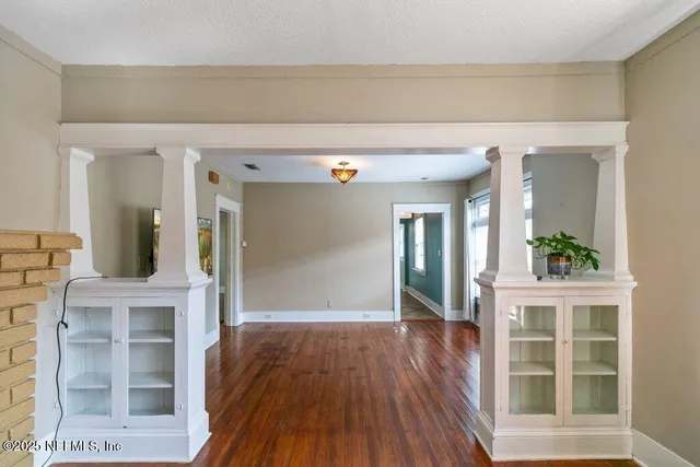 wooden floor in a hall with an entryway and wooden floor