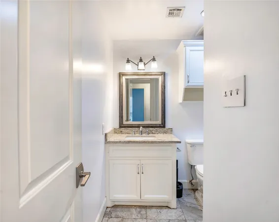 a bathroom with a shower and a toilet