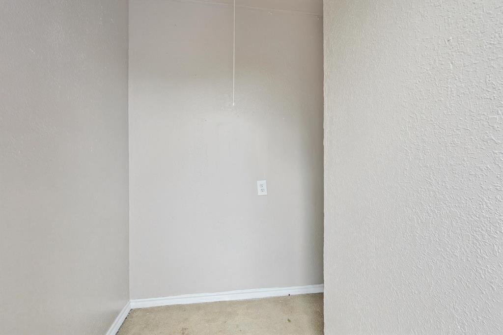 9805 Walnut Street, Unit 201 Dallas, TX 75243 - Photo 11 of 26 Empty room with carpet floors