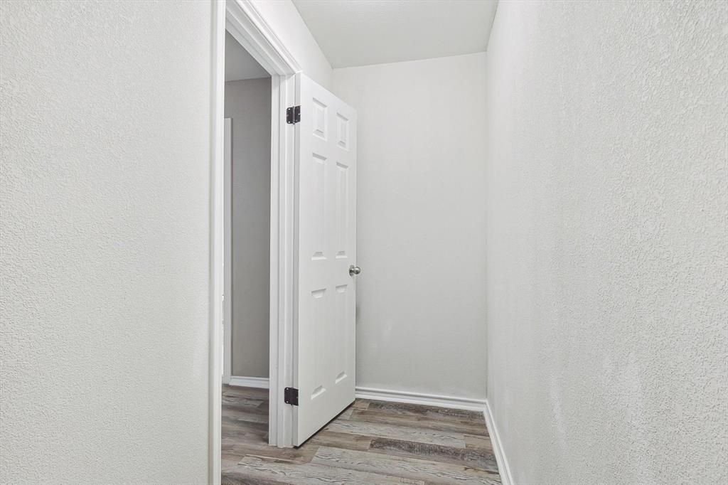 9805 Walnut Street, Unit 201 Dallas, TX 75243 - Photo 18 of 26 Hall featuring wood-type flooring