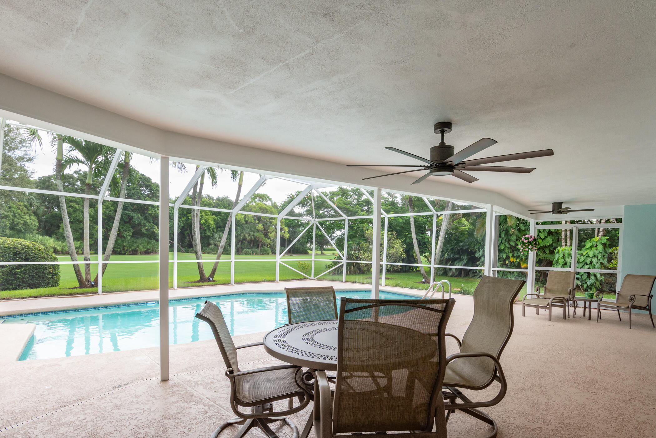 2811 Southeast Fairway West Stuart, FL 34997 - Photo 31 of 40 a view of a dining room with furniture window and outside view