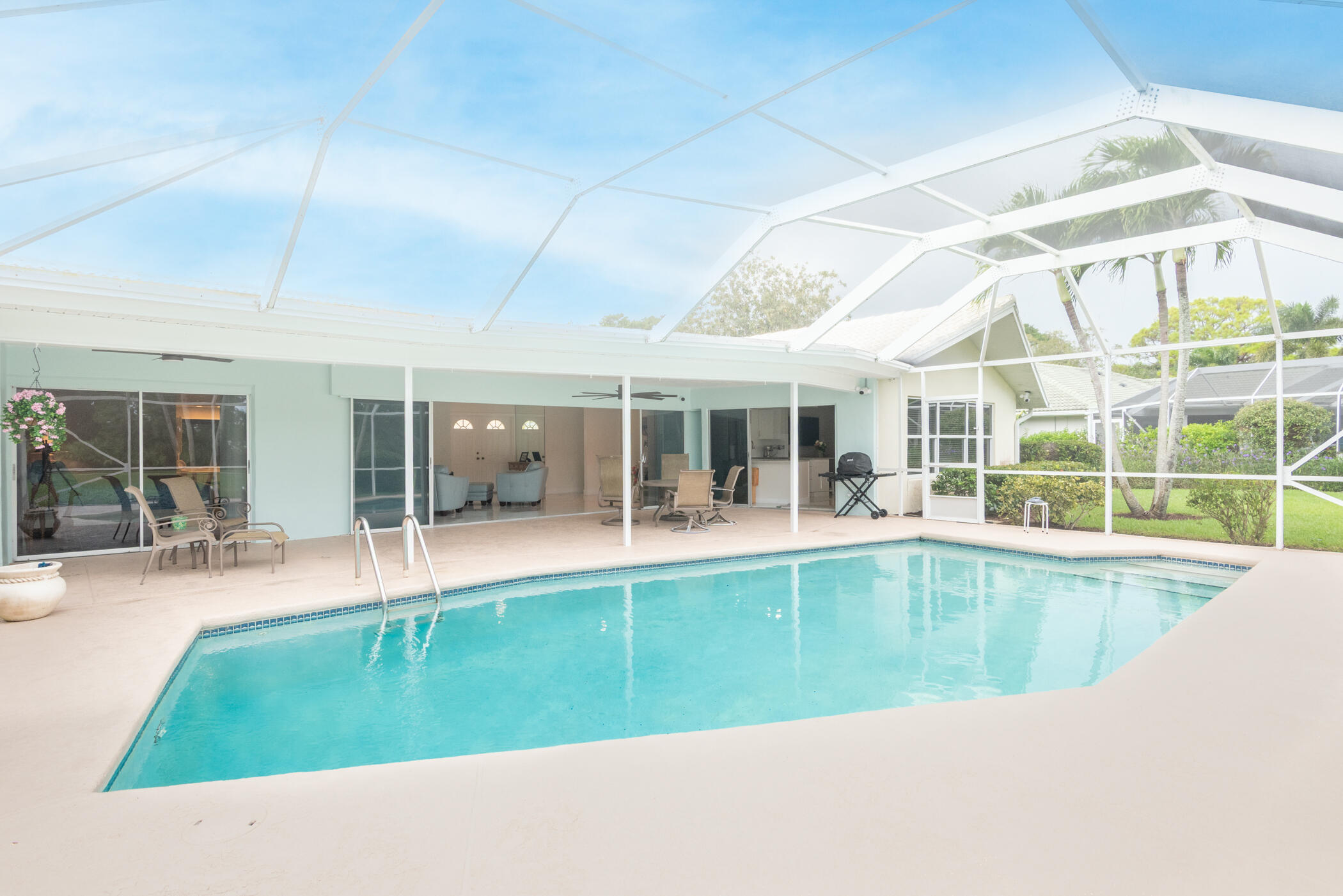 2811 Southeast Fairway West Stuart, FL 34997 - Photo 32 of 40 a view of a house with a swimming pool