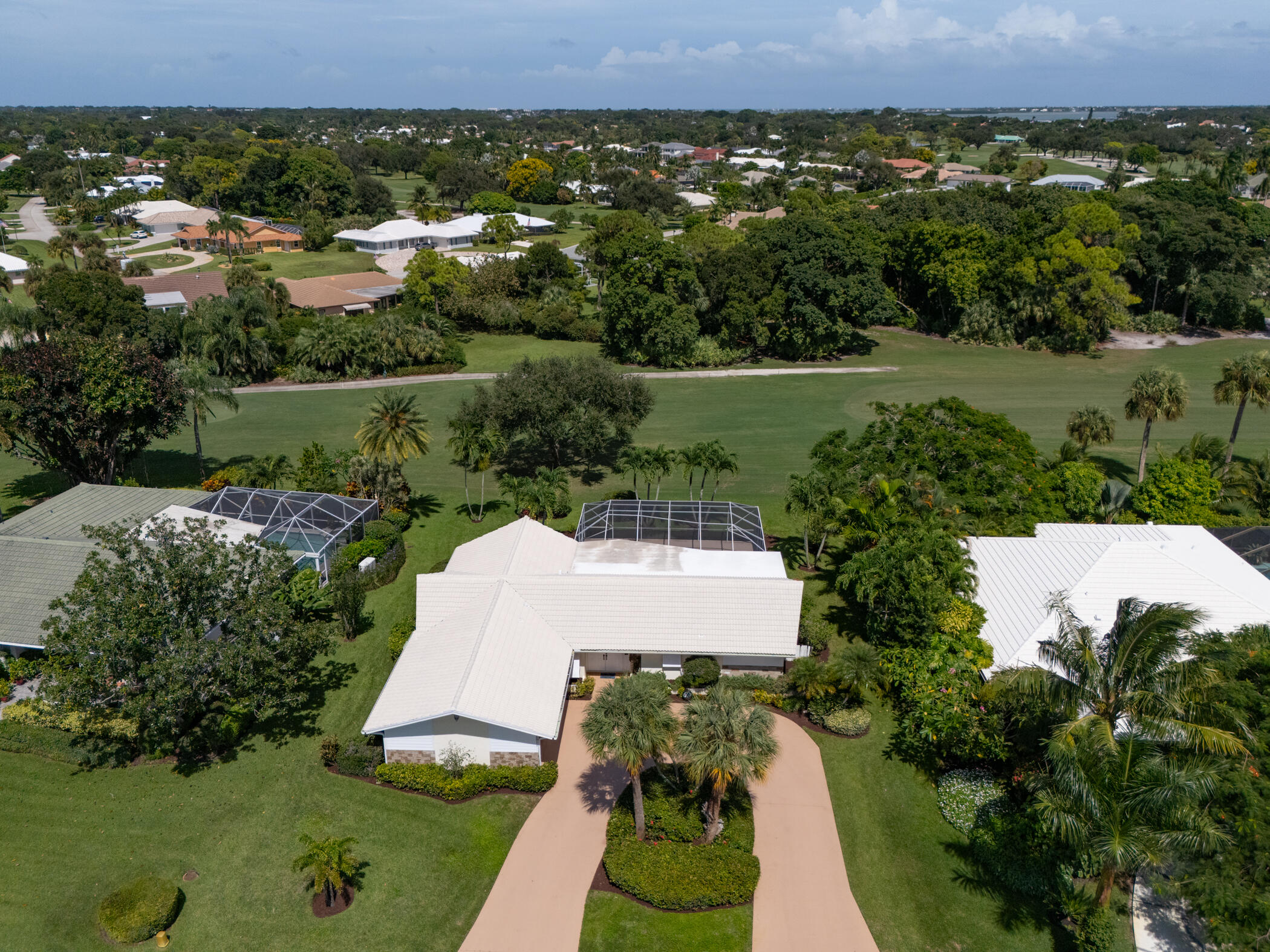 2811 Southeast Fairway West Stuart, FL 34997 - Photo 36 of 40 an aerial view of a house with a yard