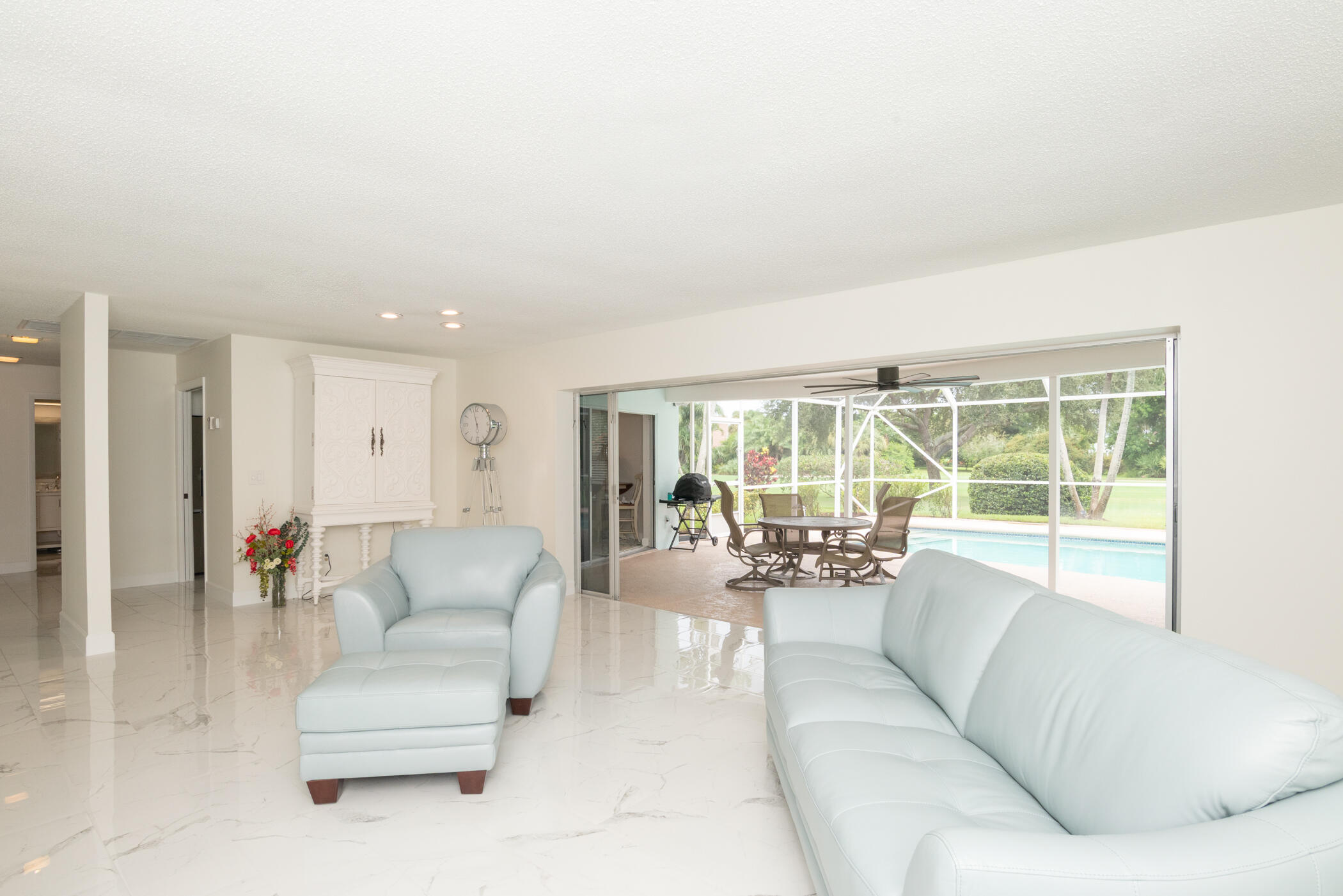 2811 Southeast Fairway West Stuart, FL 34997 - Photo 10 of 40 a living room with furniture and a large window