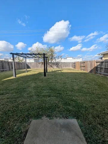a sign that is sitting in front of a house