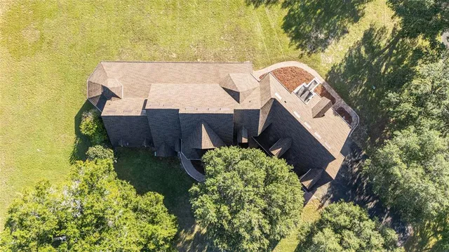 a view of a swimming pool with an outdoor space and seating area
