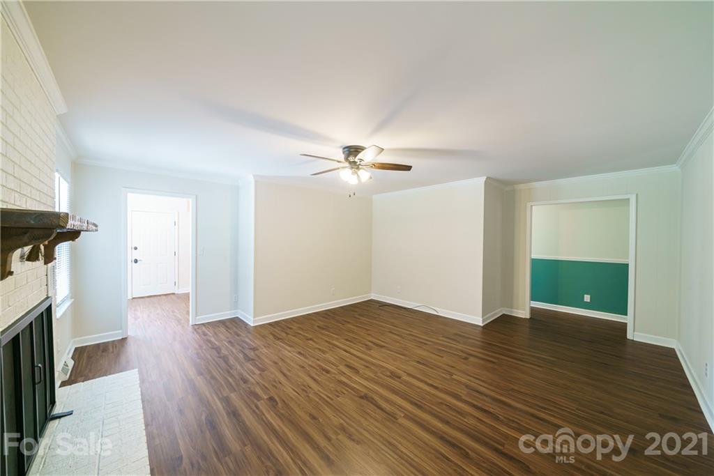 3340 Dan Hood Road Matthews, NC 28105 - Photo 12 of 48 a view of empty room with wooden floor