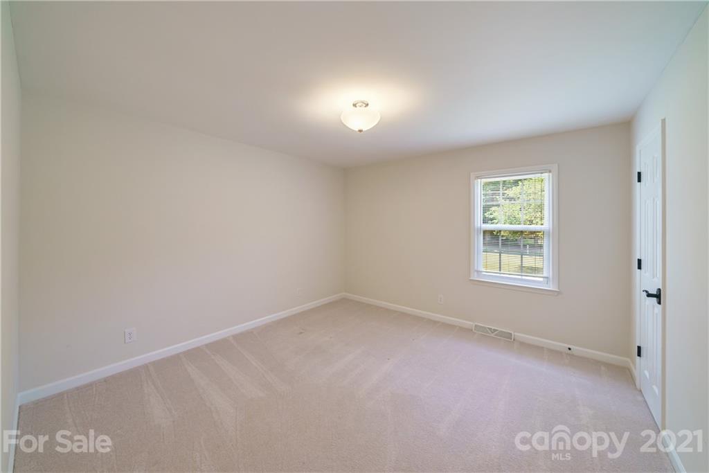 3340 Dan Hood Road Matthews, NC 28105 - Photo 26 of 48 an empty room with a window