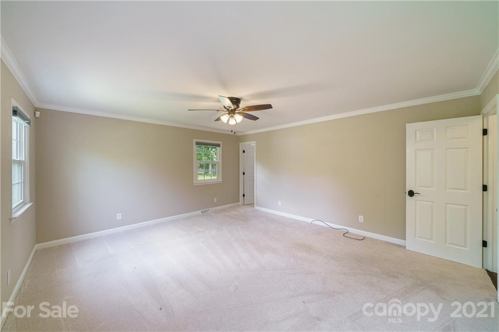 3340 Dan Hood Road Matthews, NC 28105 - Photo 32 of 48 a view of an empty room with a window