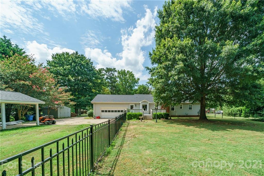 3340 Dan Hood Road Matthews, NC 28105 - Photo 8 of 48 a view of house with outdoor space and deck