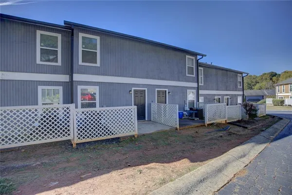 a view of a house with a patio