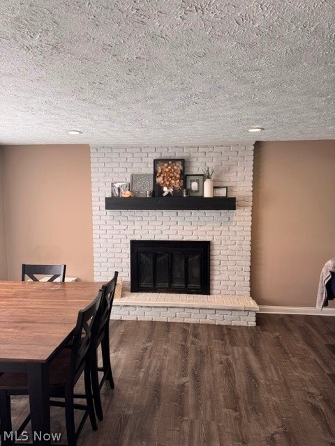 2760 Haines Road Madison, OH 44057 - Photo 20 of 33 Focal fireplace featuring painted brick and a dark floating mantel