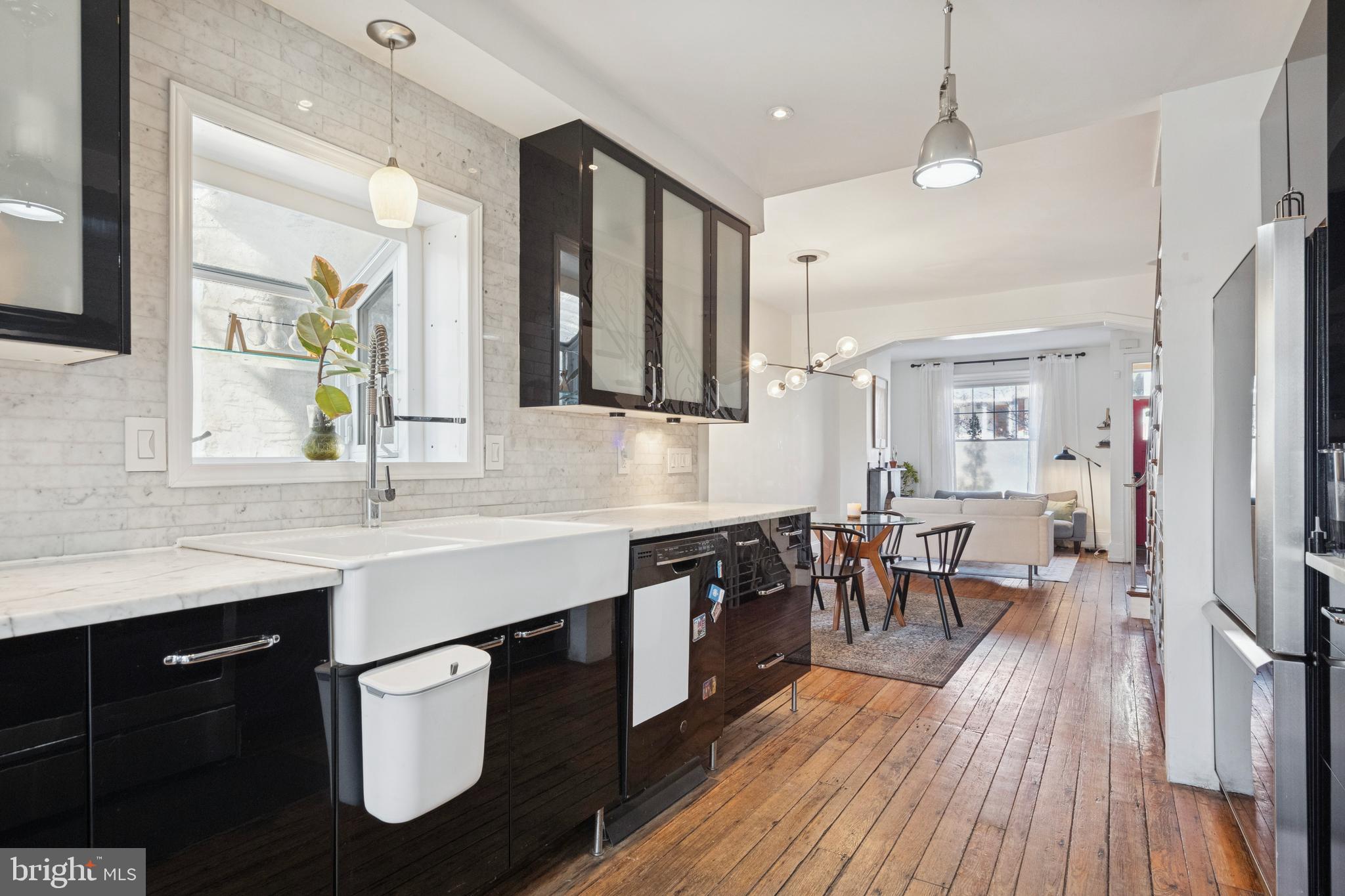 2936 Poplar Street Philadelphia, PA 19130 - Photo 11 of 27 a kitchen with lots of counter top space and dining table