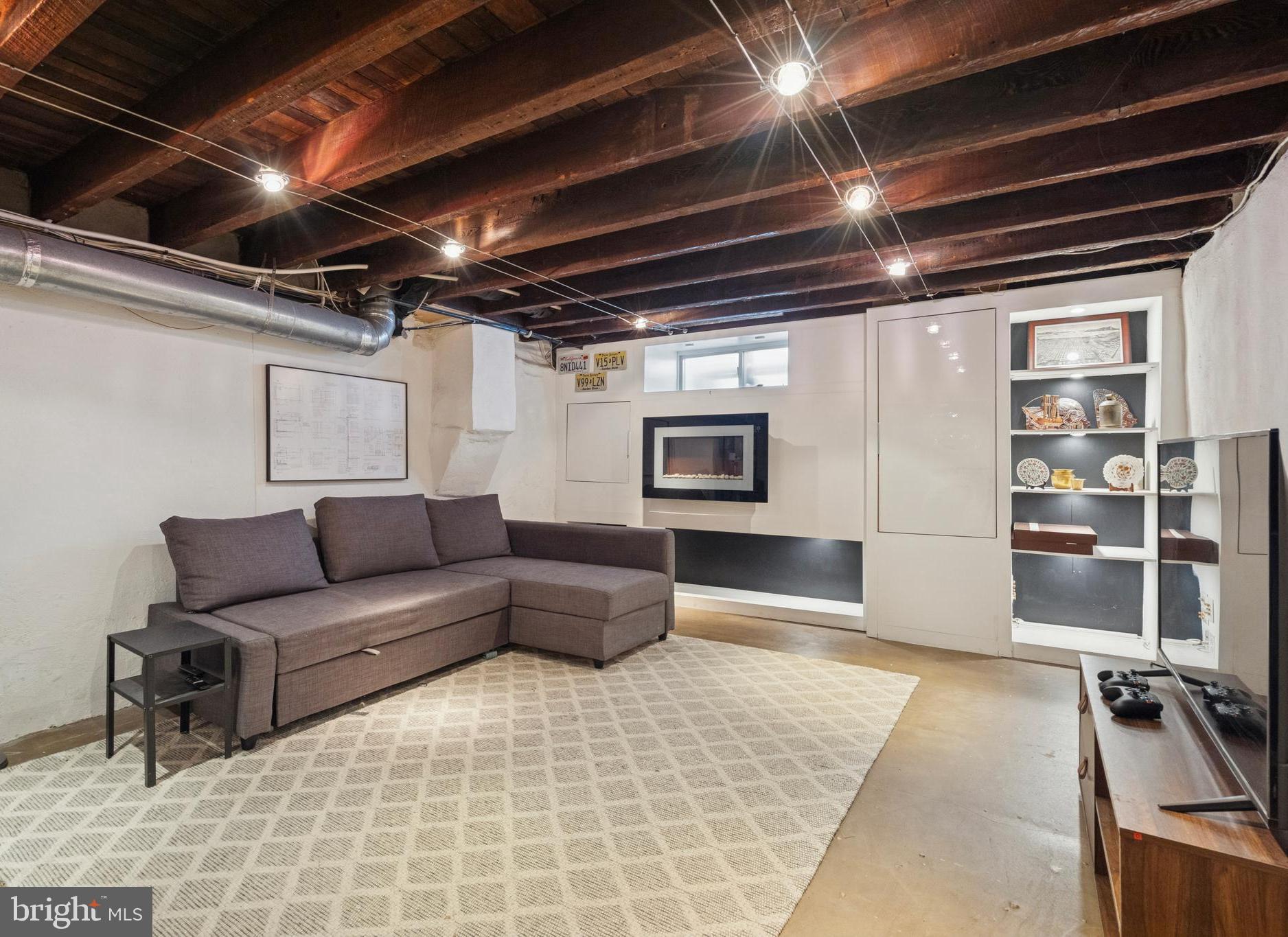 2936 Poplar Street Philadelphia, PA 19130 - Photo 23 of 27 a living room with furniture and a couch