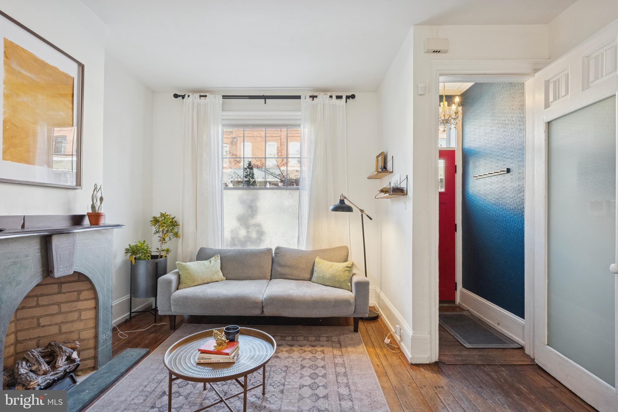 2936 Poplar Street Philadelphia, PA 19130 - Photo 3 of 27 a living room with furniture and a window