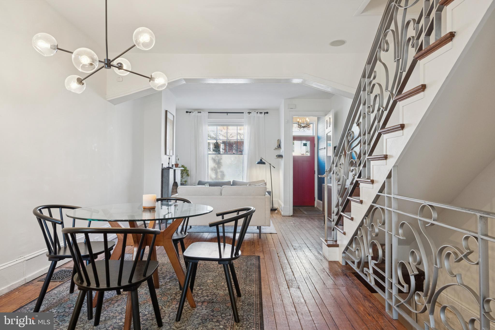 2936 Poplar Street Philadelphia, PA 19130 - Photo 9 of 27 a view of a dining room with furniture and wooden floor