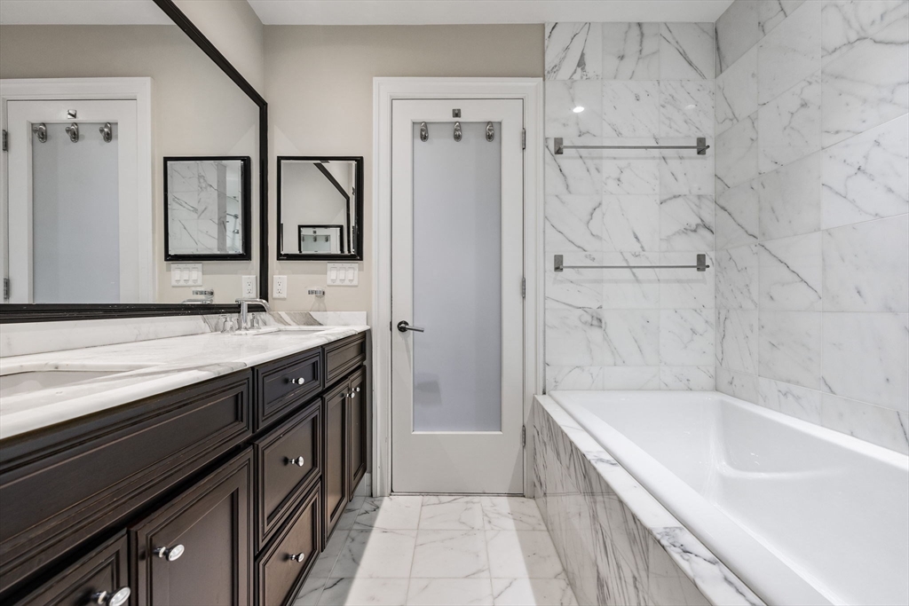 410 Boylston Street, Unit 3 Boston, MA 02116 - Photo 13 of 20 a bathroom with a bathtub and a sink