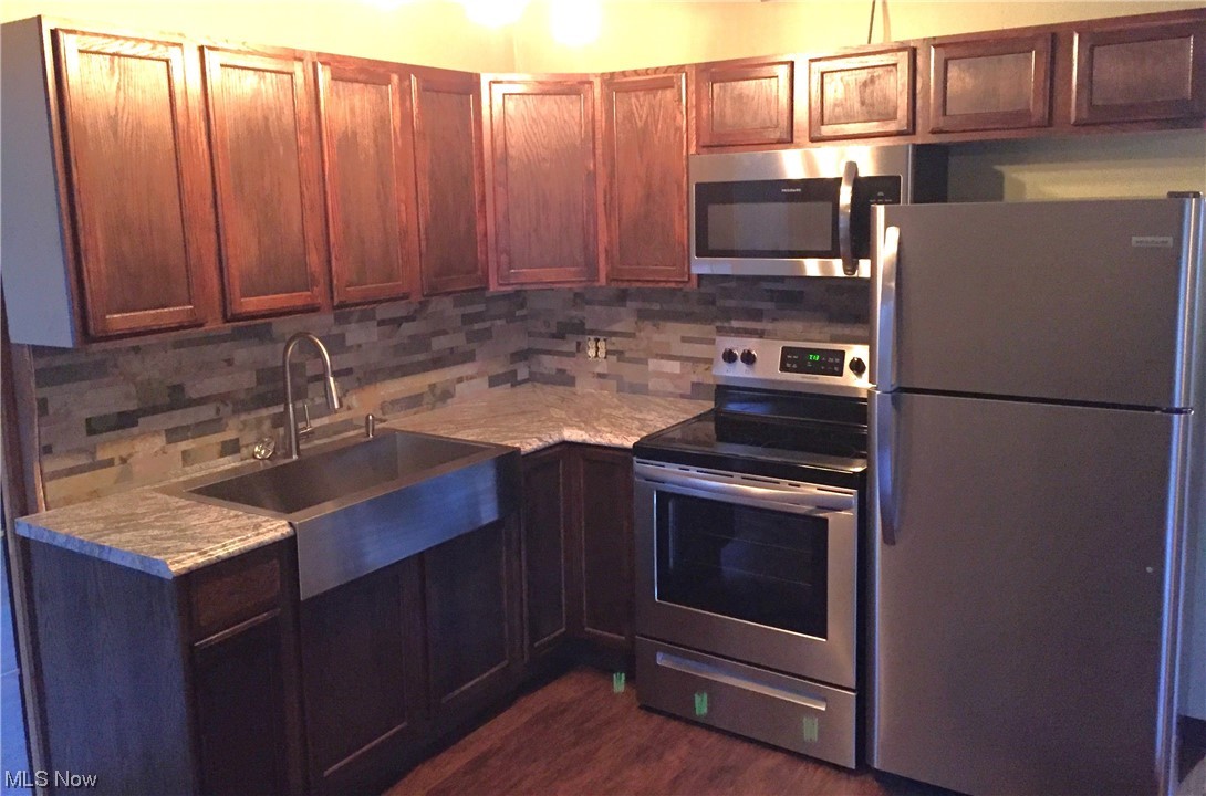 202 Middle Ridge Lane Waverly, WV 26184 - Photo 8 of 33 Nicely renovated kitchen with farmhouse sink