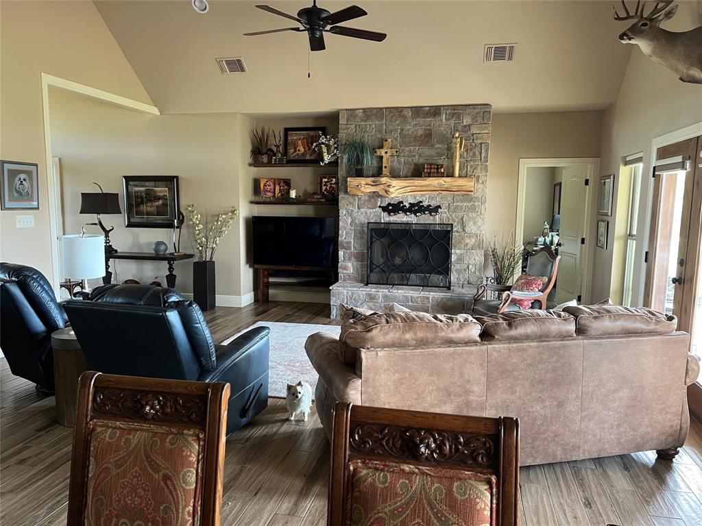 2261 Highway 276 Emory, TX 75440 - Photo 31 of 35 a living room with furniture and a fireplace