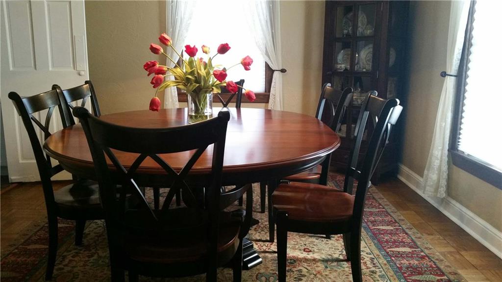 2321 Collins Road Blackridge, PA 15235 - Photo 5 of 25 Dining room accommodates large pedestal table with ease. Swinging door to kitchen.
