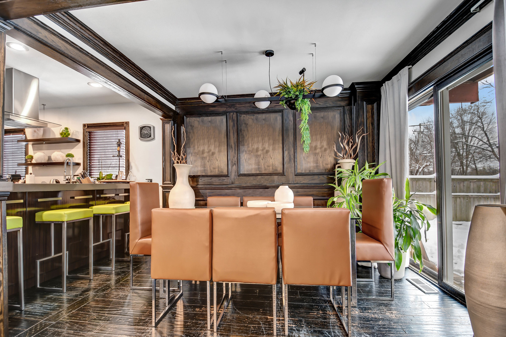 491 Old Surrey Road, Unit A Hinsdale, IL 60521 - Photo 6 of 23 a dining room with furniture potted plants and wooden floor