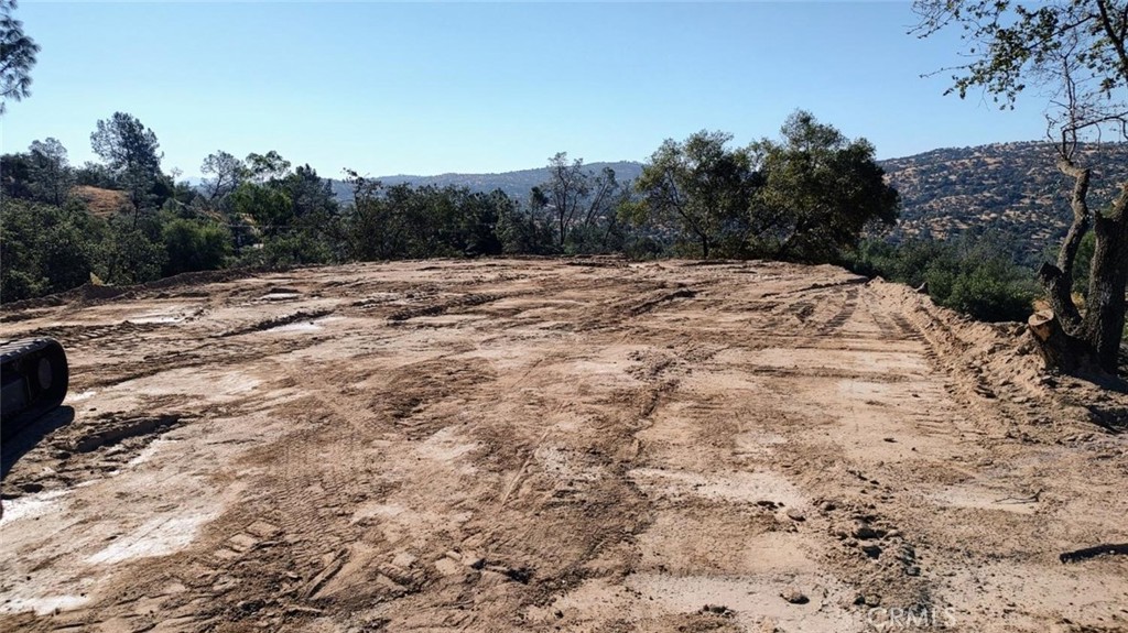 4-03ac Powder Horn Way Coarsegold, CA 93614 - Photo 3 of 7 a view of a backyard of a house