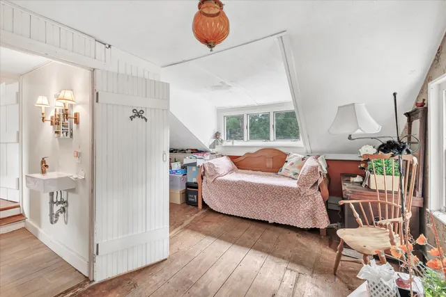 a workspace with furniture and a window