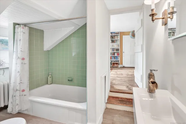 a picture of a book and a bed