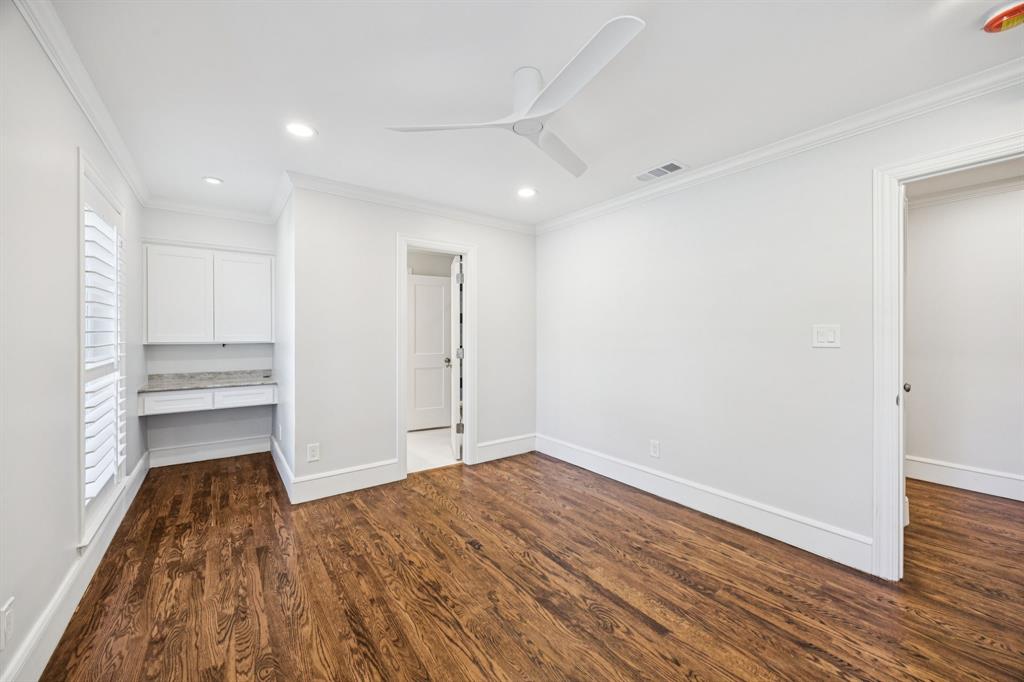 6848 Midcrest Drive Dallas, TX 75254 - Photo 21 of 38 a view of empty room with wooden floor