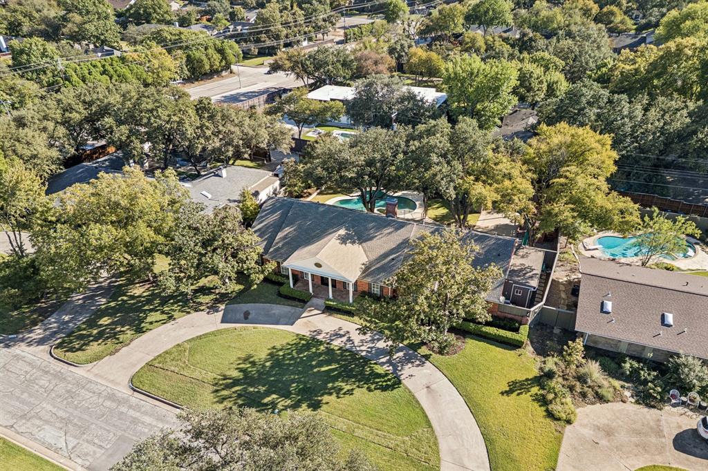 6848 Midcrest Drive Dallas, TX 75254 - Photo 35 of 38 an aerial view of residential houses with outdoor space and trees