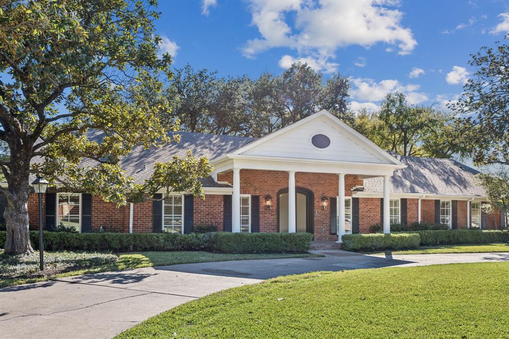 6848 Midcrest Drive Dallas, TX 75254 - Photo 38 of 38 front view of a house with a yard