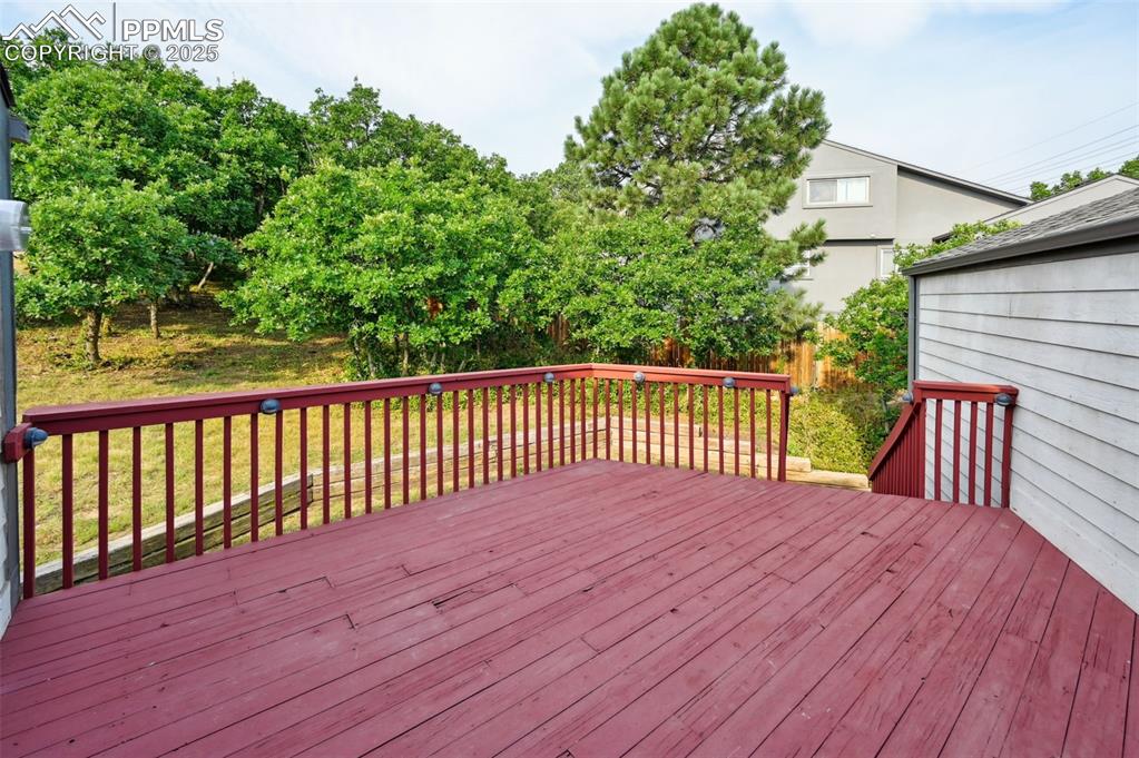 635 Royal Oak Drive Colorado Springs, CO 80906 - Photo 17 of 47 a view of backyard with a deck