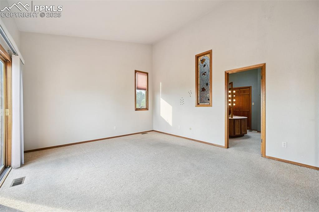 635 Royal Oak Drive Colorado Springs, CO 80906 - Photo 19 of 47 an empty room with windows
