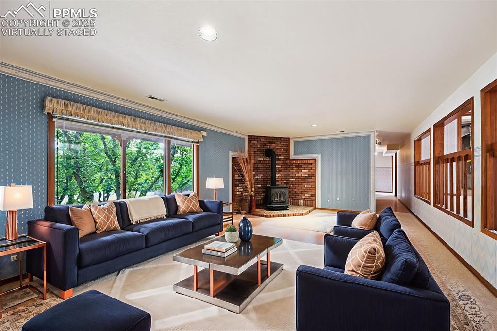 635 Royal Oak Drive Colorado Springs, CO 80906 - Photo 26 of 47 a living room with furniture and a large window