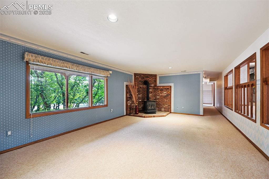 635 Royal Oak Drive Colorado Springs, CO 80906 - Photo 27 of 47 an empty room with windows