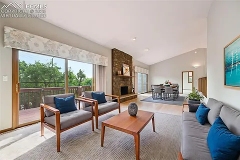 a view of empty room with floor to ceiling window