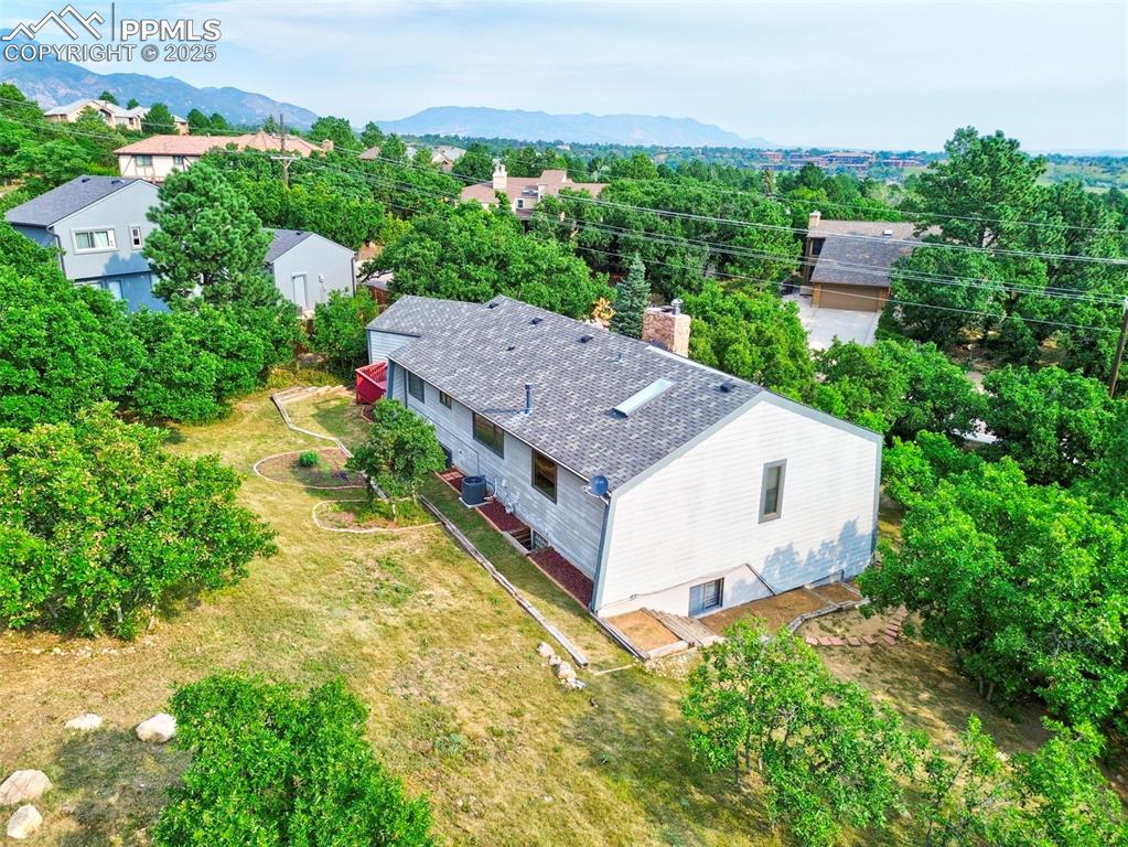 635 Royal Oak Drive Colorado Springs, CO 80906 - Photo 43 of 47 an aerial view of a house with a yard